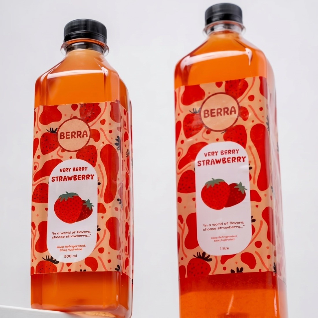 Juice bottles with a custom fruit-pattern label