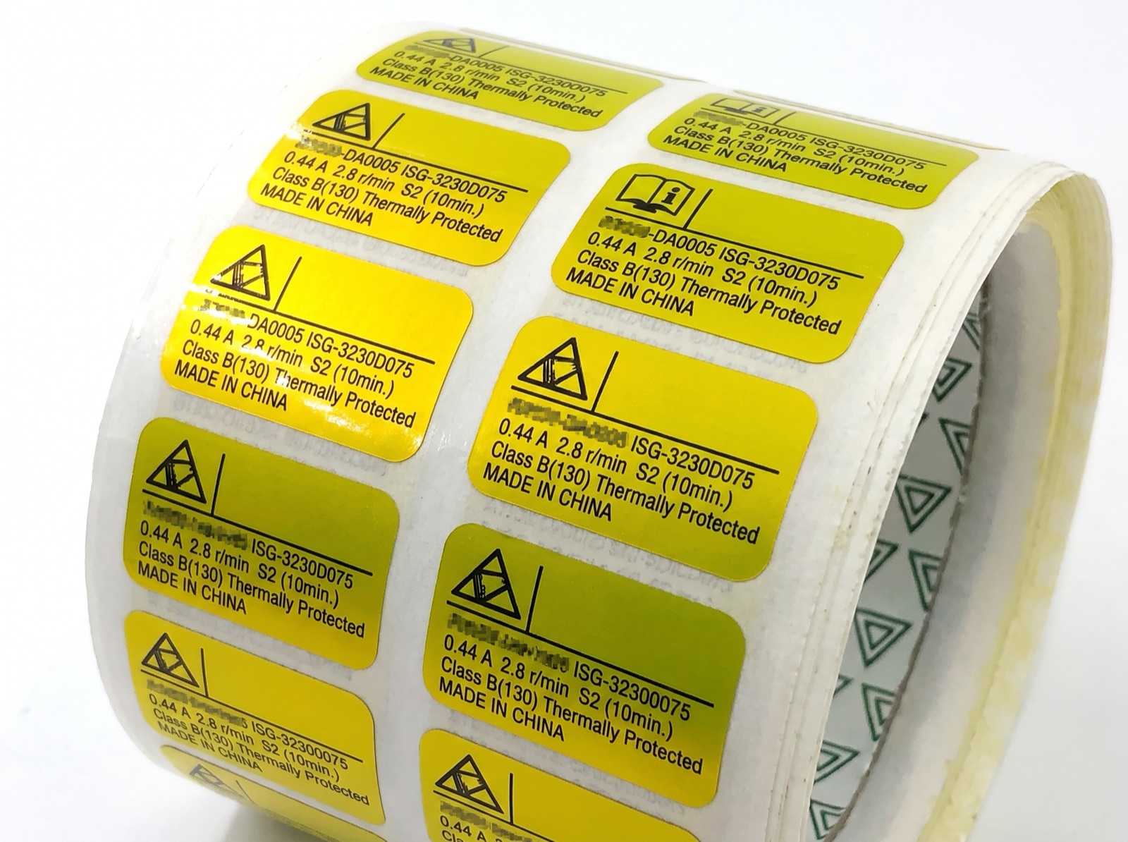 Custom printed product label roll on a studio backdrop, made by Euphora