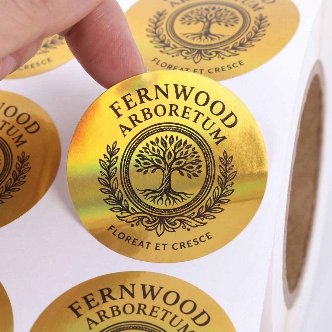 Roll of custom die-cut reward stickers with original artwork by Euphora