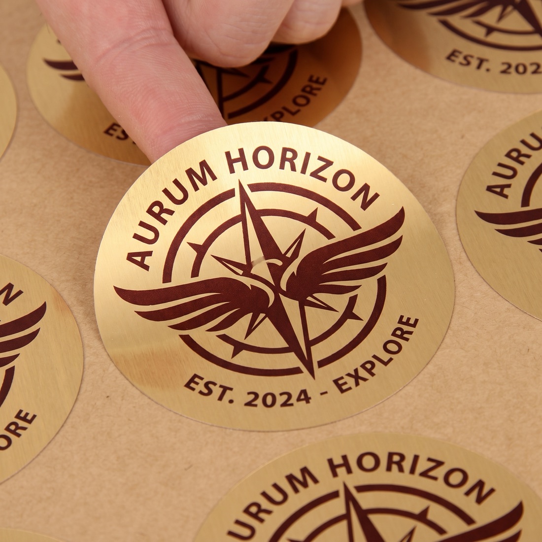 Roll of custom die-cut reward stickers with original artwork by Euphora