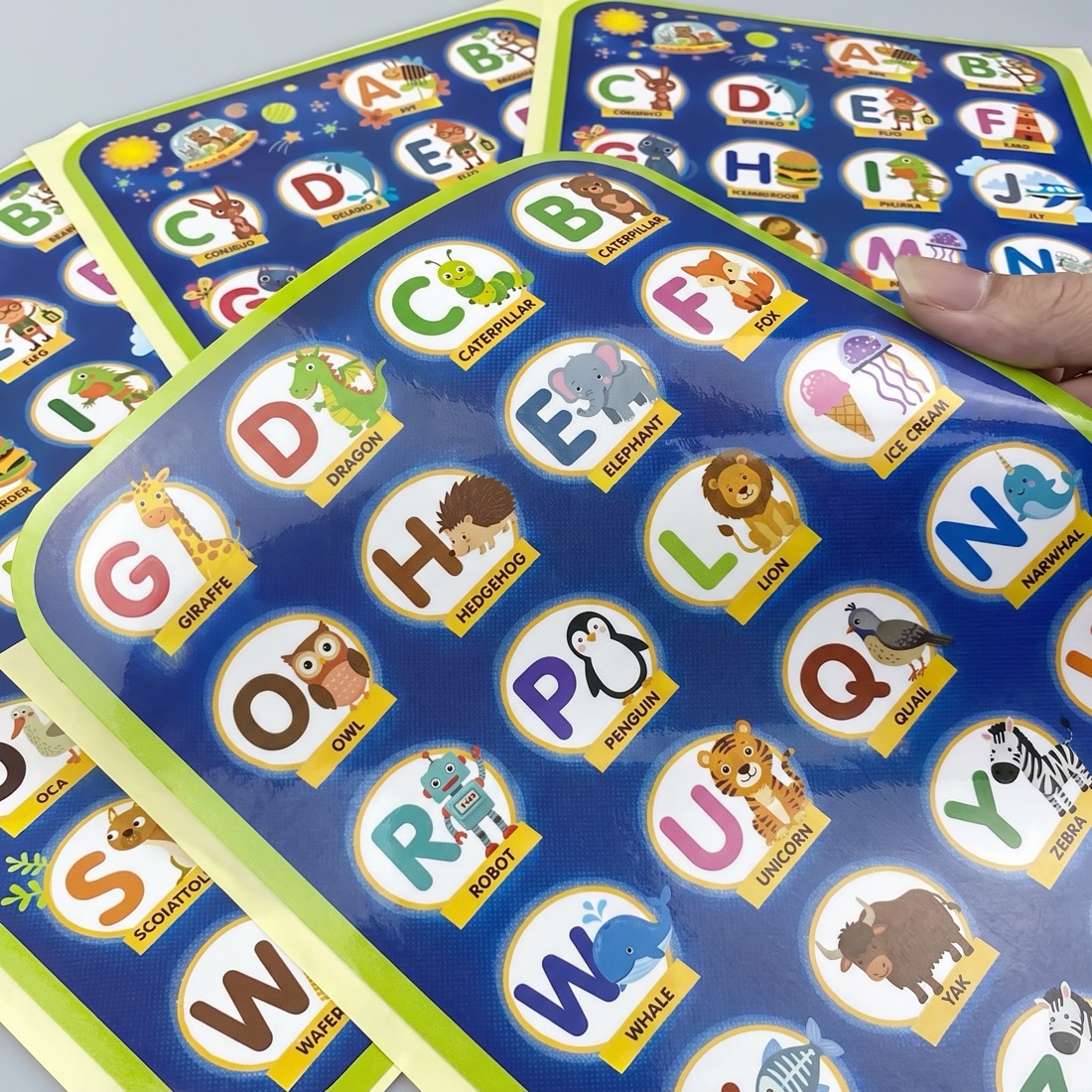 Roll of custom die-cut reward stickers with original artwork by Euphora