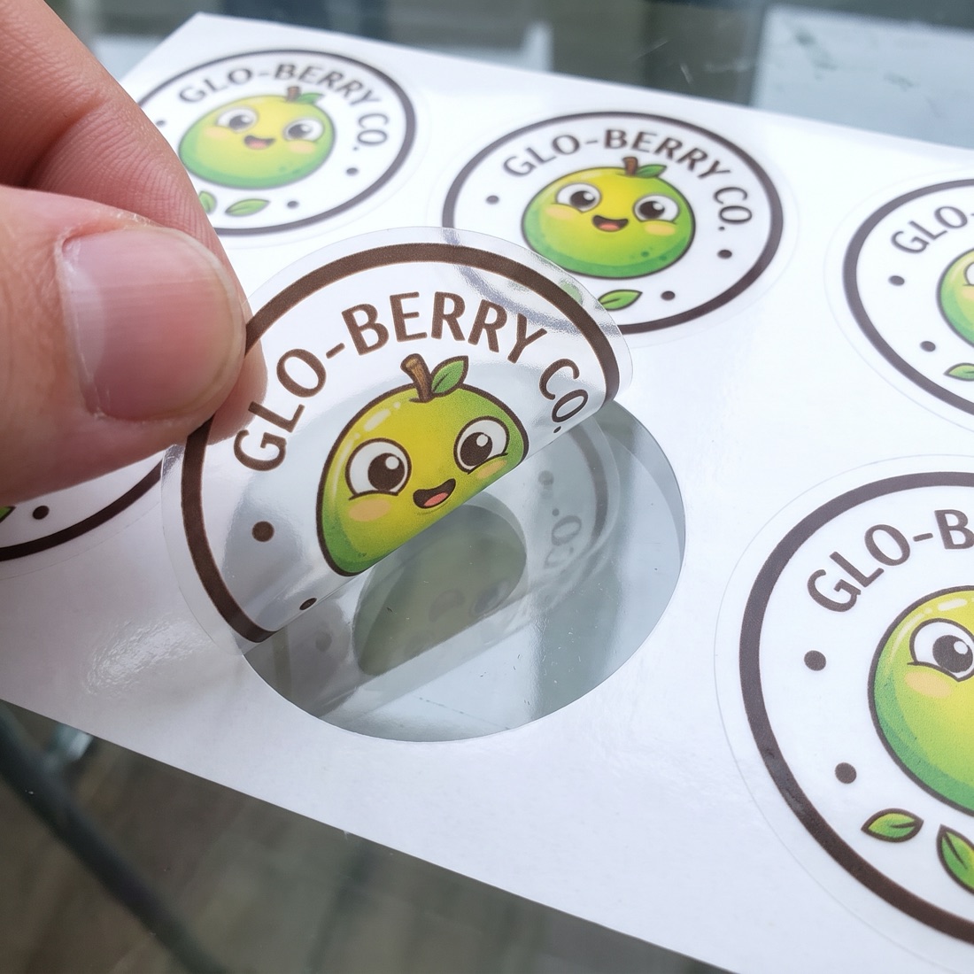 Roll of custom die-cut reward stickers with original artwork by Euphora